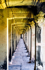 Ancient Stone Pillars in a Long Corridor, in Angkor Wat, Cambodia