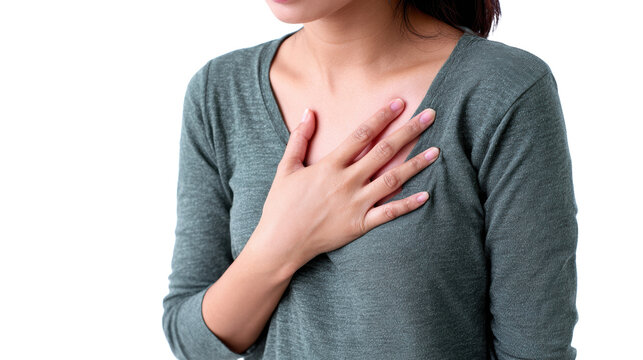 Woman expressing feelings with a hand on her chest against a white background.