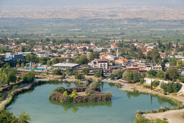 Explore the beautiful town of Pamukkale, featuring natural hot springs, unique limestone terraces,...