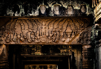 Intricate Stone Carvings on Ancient Temple Wall, in Angkor Wat, Cambodia