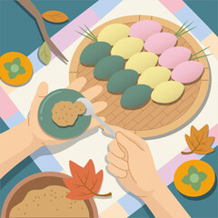 Top view of hands making Korean half-moon rice cakes (songpyeon) for Chuseok holiday