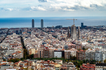 Aerial View of Barcelona with Sagrada Familia and Mediterranean Sea in Barcelona, Spain