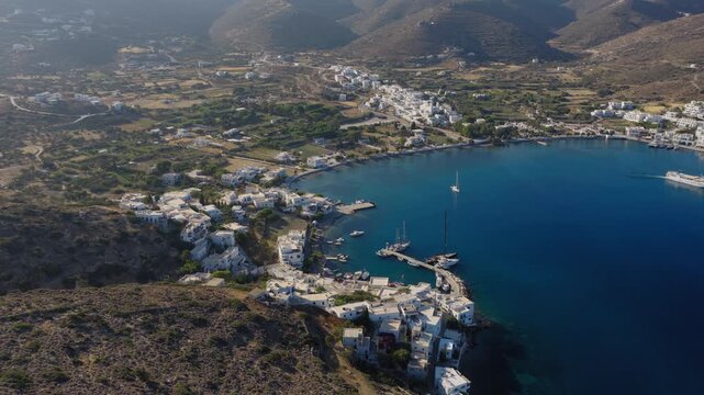 Ferries and yachts anchored in Katapola port, Amorgos, Iconic Mediterranean tourism spot, Greece