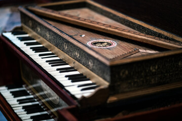 Close-Up of an Antique Piano with Intricate Design, in Brussels, Belgium
