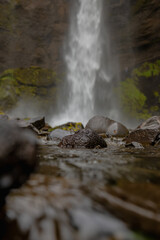 Fototapeta premium Close Up of Rocky Stream Leading to a Waterfall in Iceland