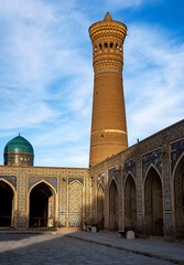 Ancient Minaret and Courtyard in Bukhara