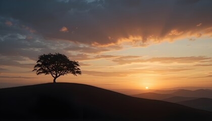 Lone tree silhouettes on a rolling hill against a dramatic sunset sky with layered mountains