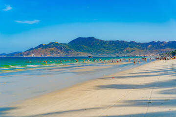 The sea beach.

Turquoise water, shallow water on the beach at DOCLET in Vietnam.