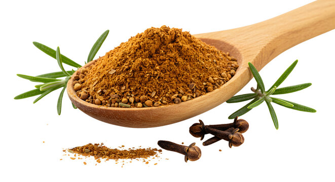 Wooden spoon filled with ground cinnamon spice surrounded by star anise and cloves, isolated on white background, perfect for cooking and baking recipes