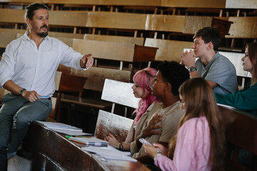 Teacher Leading Discussion With University Students in Classroom for Collaborative Learning