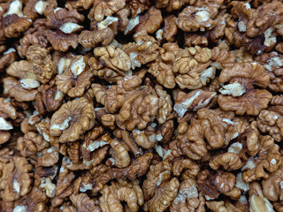 Shelled Walnuts Close-Up Texture Background