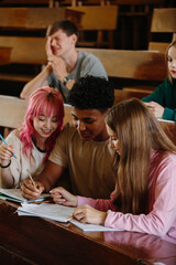 Group of Students Collaborating on a Study Project in a Classroom Setting