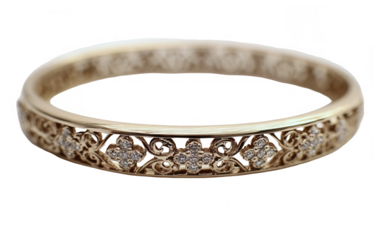 Gold band ring with intricate floral filigree and small diamonds