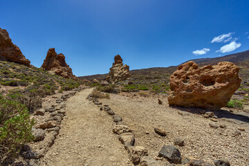 Hiking trail among volcanic rocks