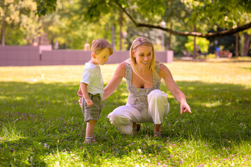 Fototapeta premium Blonde Woman With Young Child