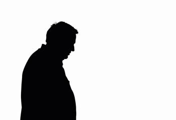 Man in silhouette looking down against a white background  