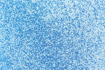 Shimmering Blue Glitter Texture Background with Light Reflecting Tiny Particles