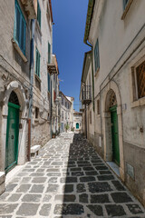 A narrow street in Roccamandolfi, a mountain village in Molise, Italy.