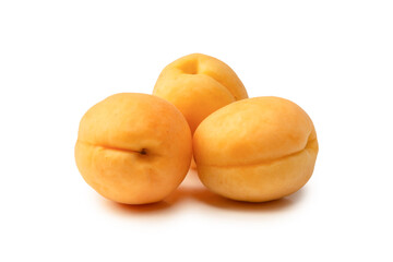 Ripe juicy orange apricots isolated on white background.