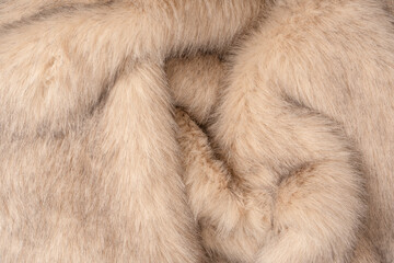 Texture of faux fur as a background, top view.