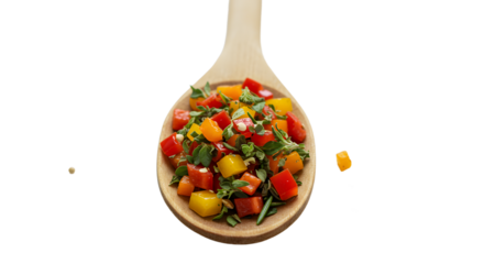 Colorful diced bell peppers and herbs on a wooden spoon isolated on black background, perfect for healthy cooking and recipe illustrations