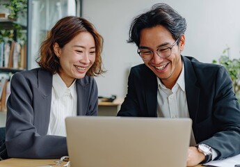 Young Professionals Engaged in Collaborative Work Session at Modern Office Meeting