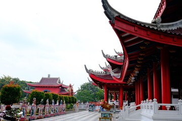 Red-roofed Sam Poo Kong temple in Semarang, Indonesia, with traditional Chinese architecture, red...