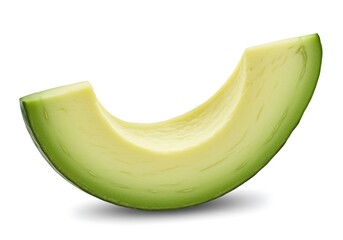 A single slice of a ripe avocado with smooth green skin and creamy yellow flesh on a white background