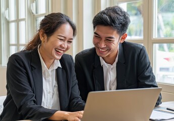 Obraz premium Modern Business Meetings Dynamic Interactions Among Young Asian Professionals in Office Settings