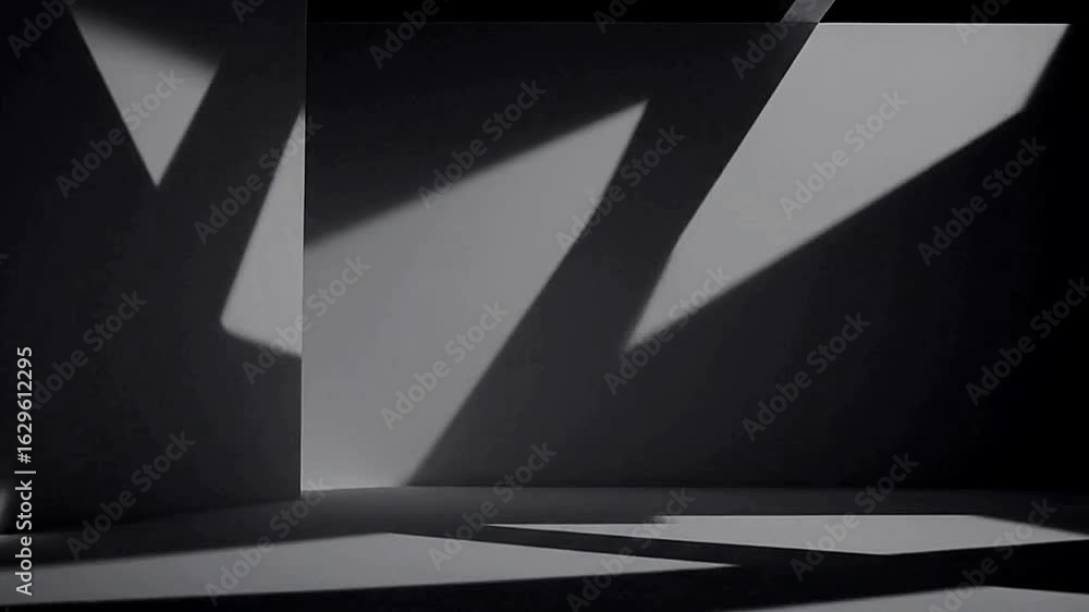 Poster gray room light casting angular shadows on the walls and floor