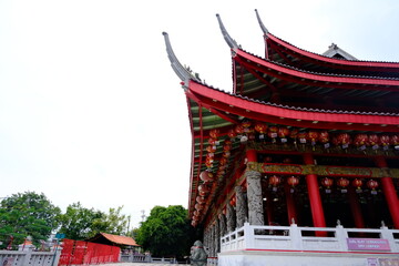 Red-roofed Sam Poo Kong temple in Semarang, Indonesia, with traditional Chinese architecture, red...