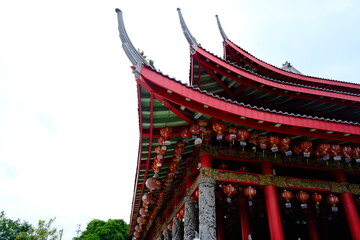Red-roofed Sam Poo Kong temple in Semarang, Indonesia, with traditional Chinese architecture, red...