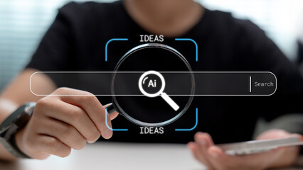 Person holding magnifying glass over AI search bar, symbolizing idea generation and smart technology for digital innovation and creative thinking.