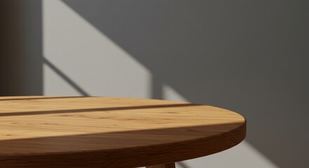 Sunlit Round Wooden Table in Minimalist Room