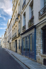Obraz premium Paris, typical buildings in the Marais, rue Saint-Paul, in the center of the french capital 