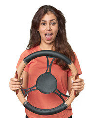 Young Middle Eastern woman with steering wheel, driving concept