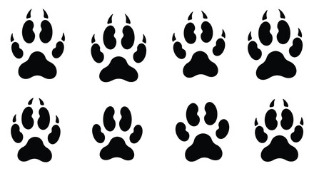 Collection of black animal paw prints on a white background illustrating tracks and trails
