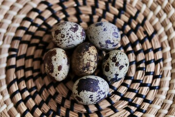 quail eggs in a basket