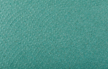 Green paper texture, recycled cardstock. Old crumpled recycled paper of old crumpled recycled paper