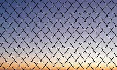 Minimalist chain-link fence with diamond pattern against a serene gradient sky. Soft sunset or...