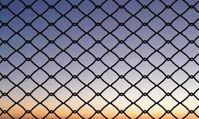 Minimalist chain-link fence with diamond pattern against a serene gradient sky. Soft sunset or...