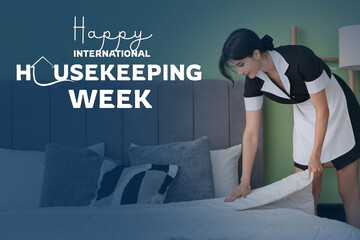 Young chambermaid making bed in bedroom