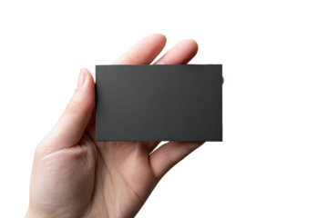 A hand holds a blank, dark gray business card against a black background