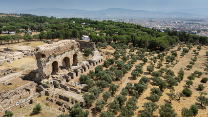 Ancient Ruins of Tralleis in Aydin, Turkey with Mountains and Olive Trees