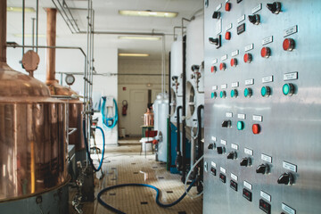 Close-up of copper brewhouse command panel.