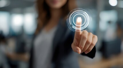 A focused young woman interacts with a digital interface, showcasing innovation and technology in a modern workspace.