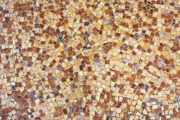 Wall of old mosaic tiles. Background of square colored tiles