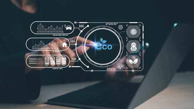 A person interacts with a digital eco-interface on a laptop, showcasing eco-friendly technology and data visualization for sustainability.