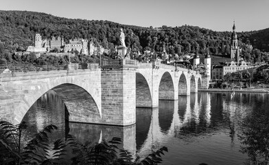 Panorama of Heidelberg. Old town with castle and baroque Karl Theodor Bridge and its twin tower...