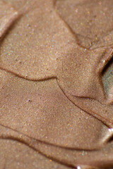 Cosmetic swatch, texture, shiny, golden highlighter